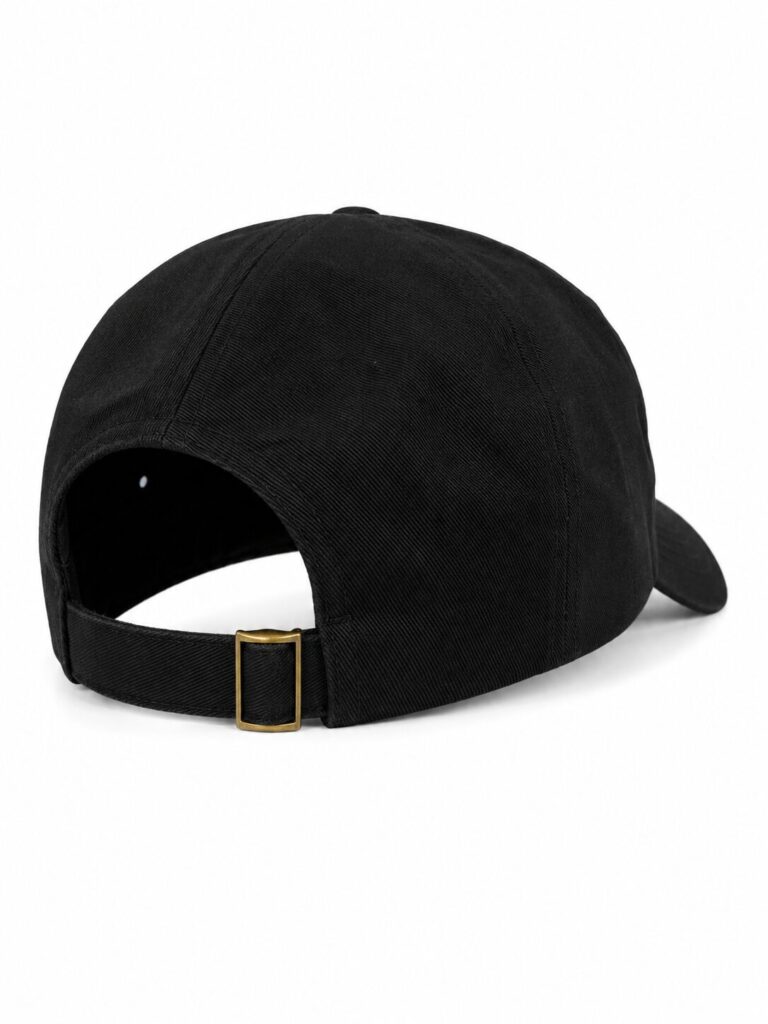 Back view of a plain black baseball cap with an adjustable strap and gold buckle.